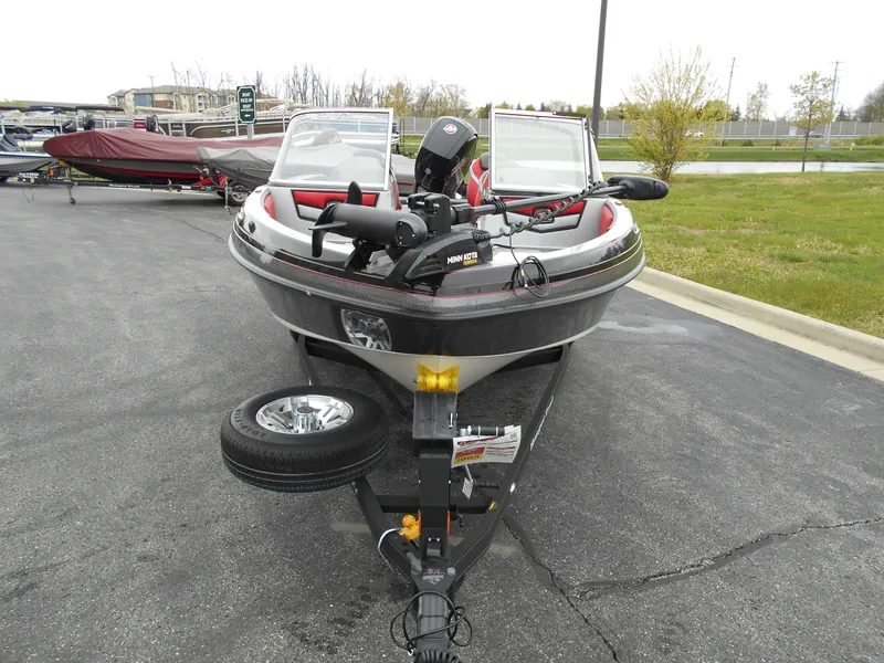 Slide: The Image of 2024 Ranger 1850MS fishing boat on trailer in parking lot. - 3