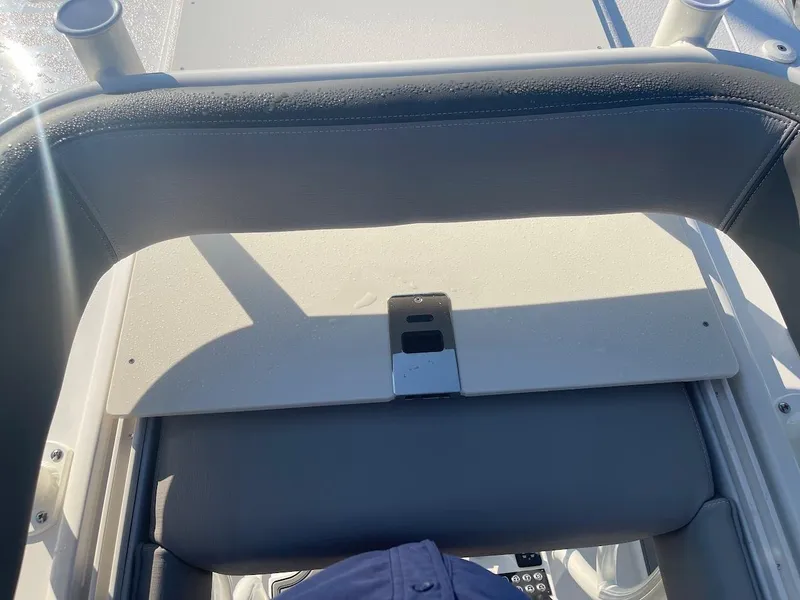 Slide: The Image of 2024 Sea Born LX 24 LE boat console and seating area. - 18