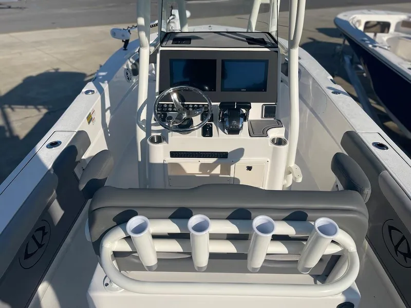 Slide: The Image of 2024 Sea Born LX 24 LE boat console with dual screens and rod holders. - 3