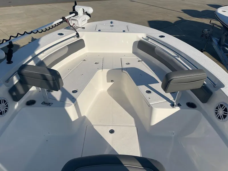 Slide: The Image of 2024 Sea Born LX 24 LE boat interior with seating and storage compartments. - 5