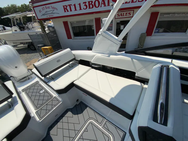 Slide: The Image of 2025 Cobalt R6 Outboard boat interior with white seating at RT113 Boat Sales. - 17