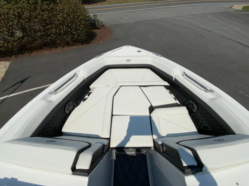 Slide: The Image of 2025 Cobalt R6 Outboard boat with sleek white seating and modern design. - 23