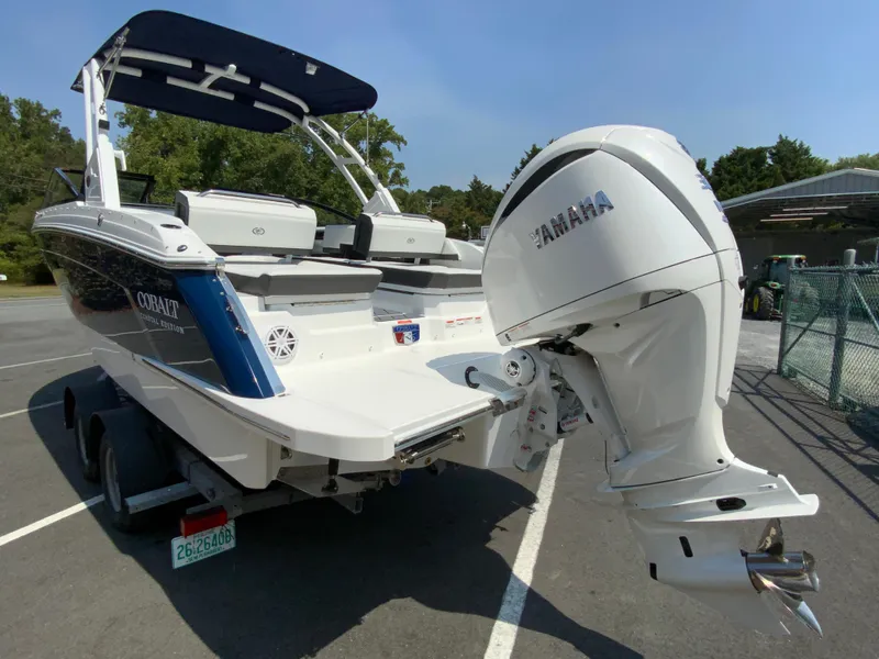 Slide: The Image of 2025 Cobalt R6 Outboard boat with Yamaha engine, parked on a trailer. - 8
