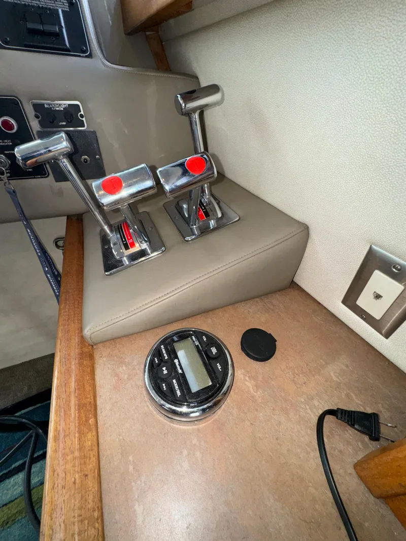 Slide: The Image of Dual throttle controls on a 1996 Bayliner 3388 Command Bridge Motoryacht. - 23