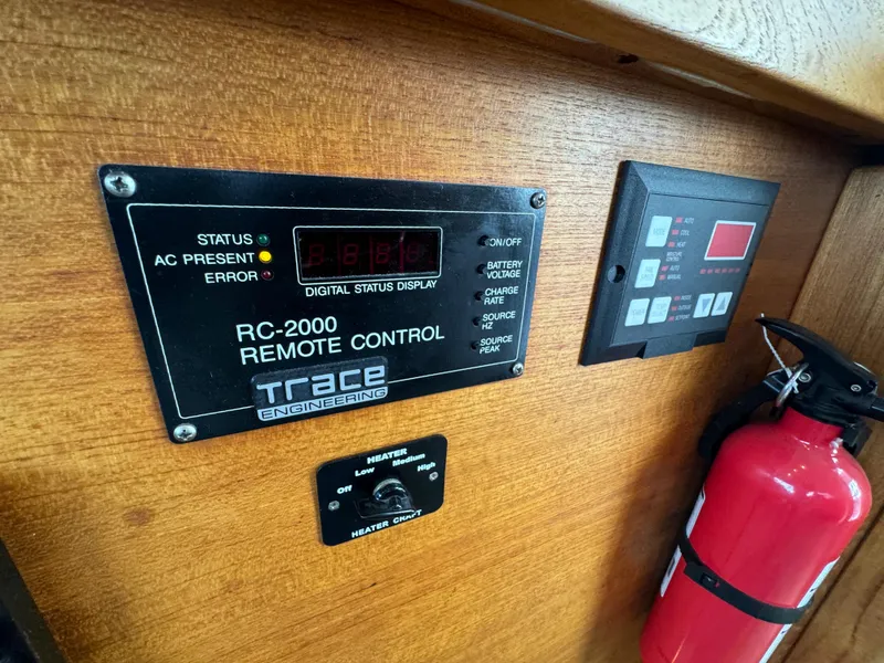 Slide: The Image of Control panel of a 1996 Bayliner 3388 Command Bridge Motoryacht with fire extinguisher. - 29