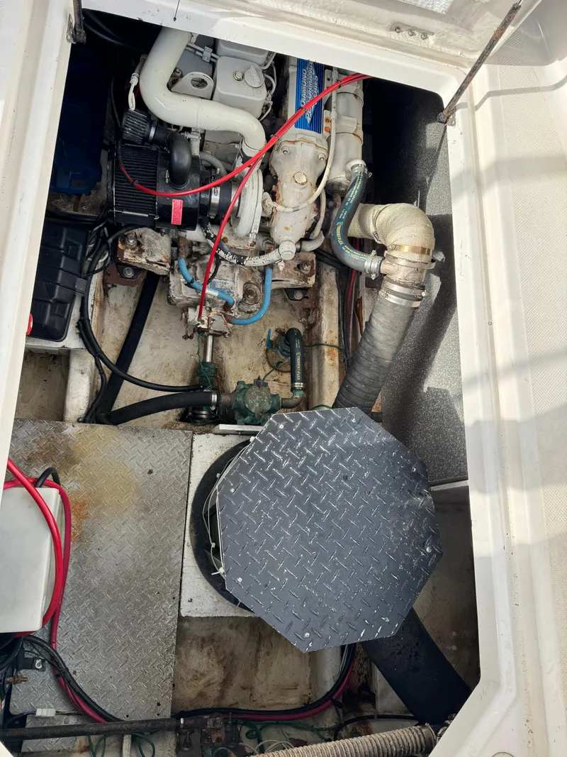 Slide: The Image of Engine compartment of a 1996 Bayliner 3388 Command Bridge Motoryacht. - 49