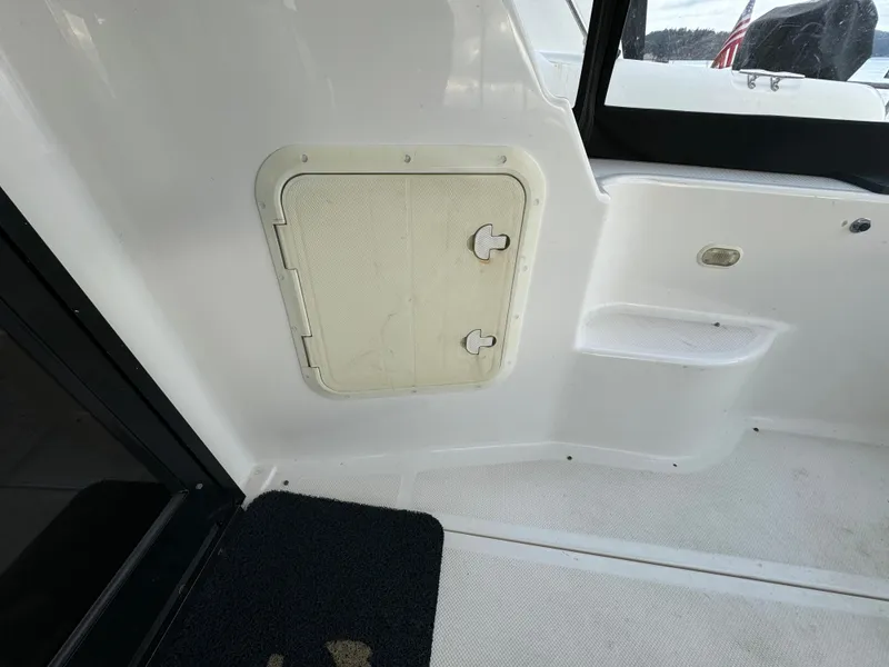 Slide: The Image of 1996 Bayliner 3388 Command Bridge Motoryacht interior hatch and seating area. - 8