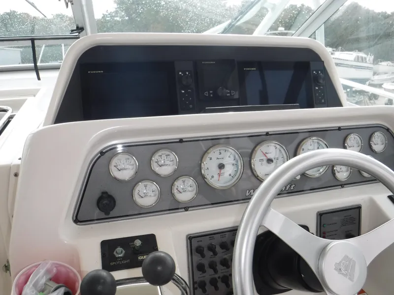 Slide: The Image of Kitchen area in 2004 Wellcraft 330 Coastal with open fridge. - 34