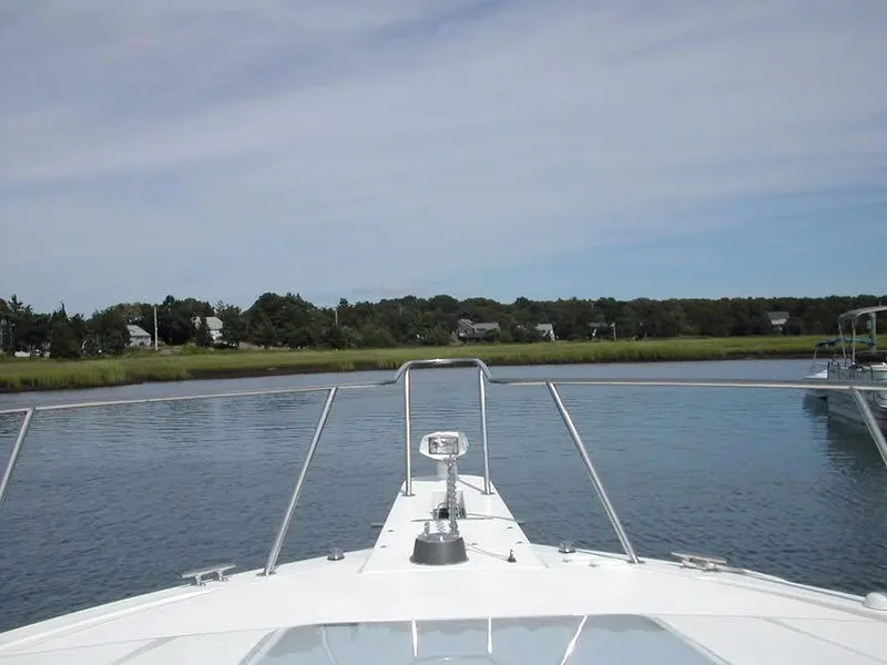 Slide: The Image of View from Wellcraft 330 Coastal 2004 over calm waters. - 5