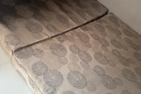 Slide: The Image of 2024 Crownline 270 CR interior upholstery with patterned fabric design. - 18