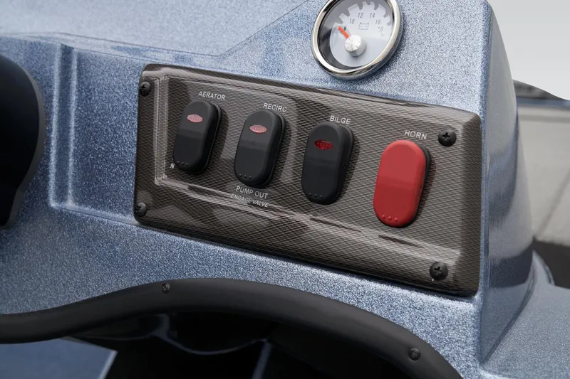 Slide: The Image of Control panel of 2024 Nitro Z18 Pro boat with switches and gauge. - 29