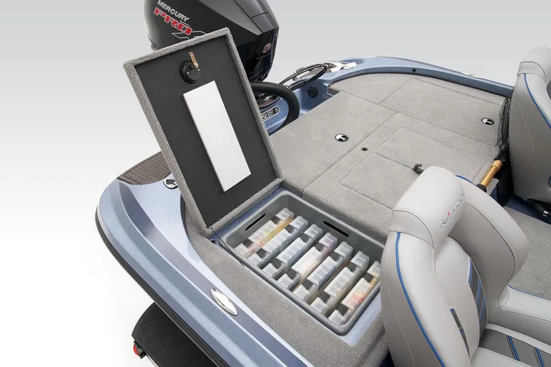 Slide: The Image of 2024 Nitro Z18 Pro boat with open storage compartment and organized tackle boxes. - 44