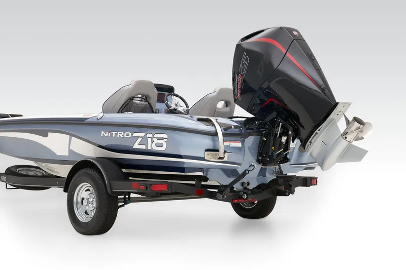 Slide: The Image of 2024 Nitro Z18 Pro boat with powerful outboard motor on trailer. - 49