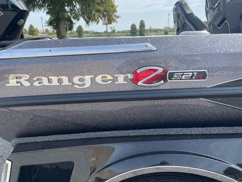 Slide: The Image of 2024 Ranger Z521R Ranger Cup Equipped boat side view with logo. - 4