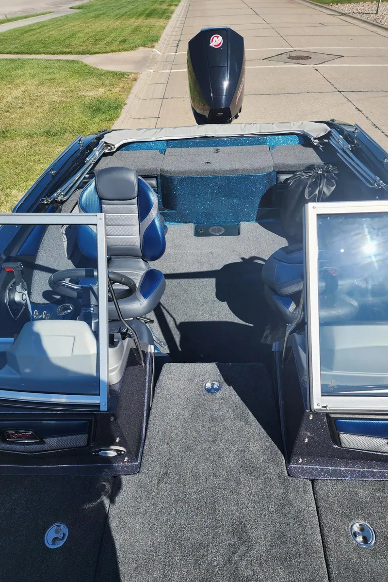 Slide: The Image of 2024 Ranger 1880MS fishing boat with dual seats and open deck. - 10