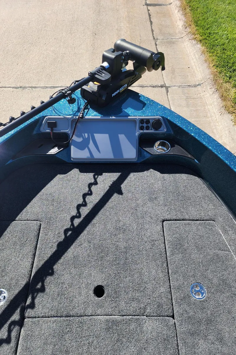 Slide: The Image of 2024 Ranger 1880MS boat deck with mounted equipment and control panel. - 9