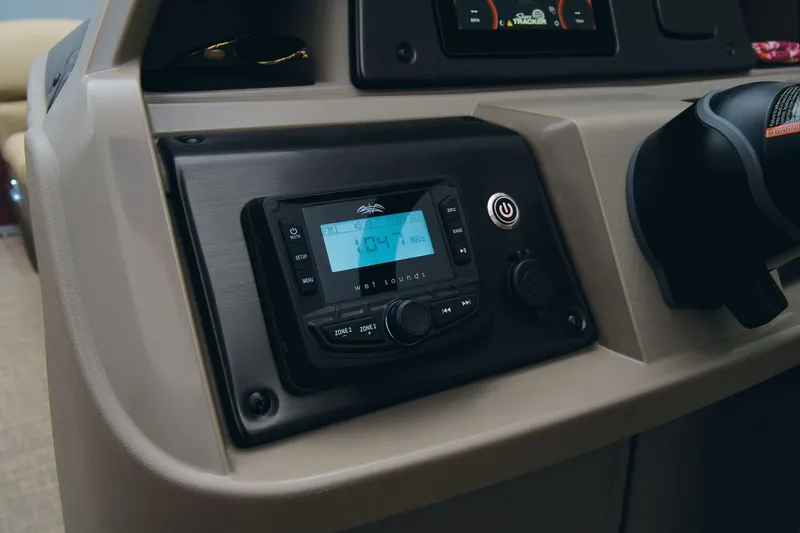 Slide: The Image of 2024 Sun Tracker Party Barge 20 DLX dashboard with modern control panel. - 34