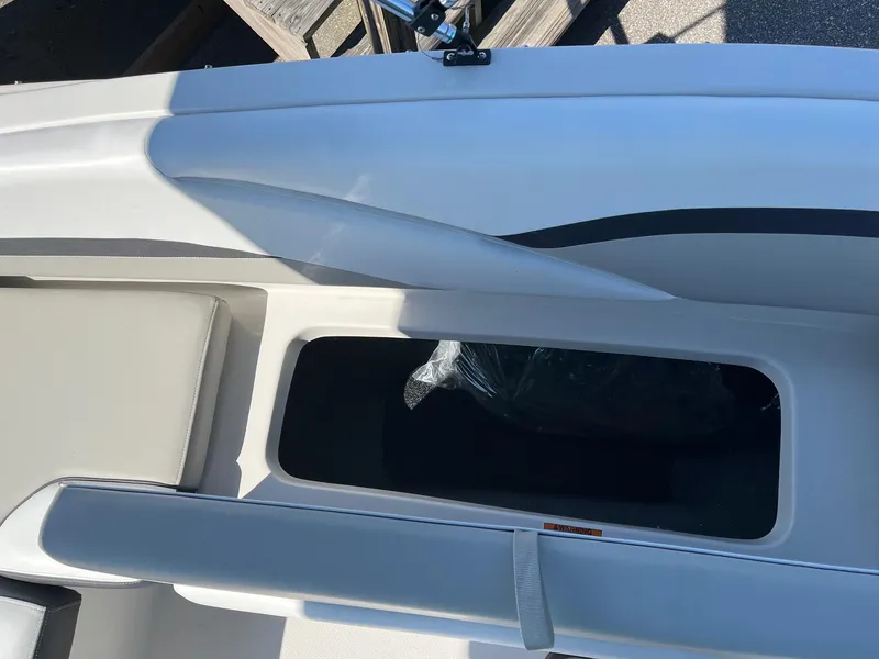 Slide: The Image of 2024 Starcraft SVX 191 boat interior storage compartment. - 17