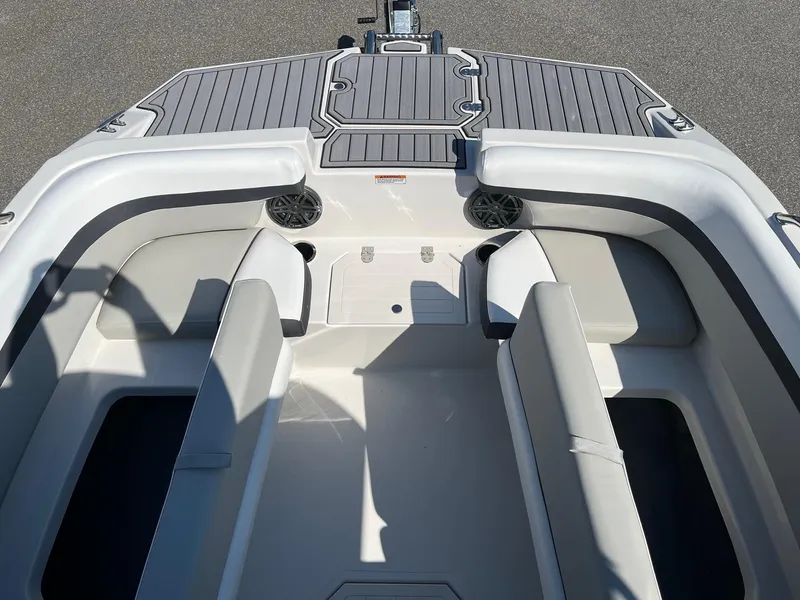 Slide: The Image of 2024 Starcraft SVX 191 boat interior with seating and speakers. - 13