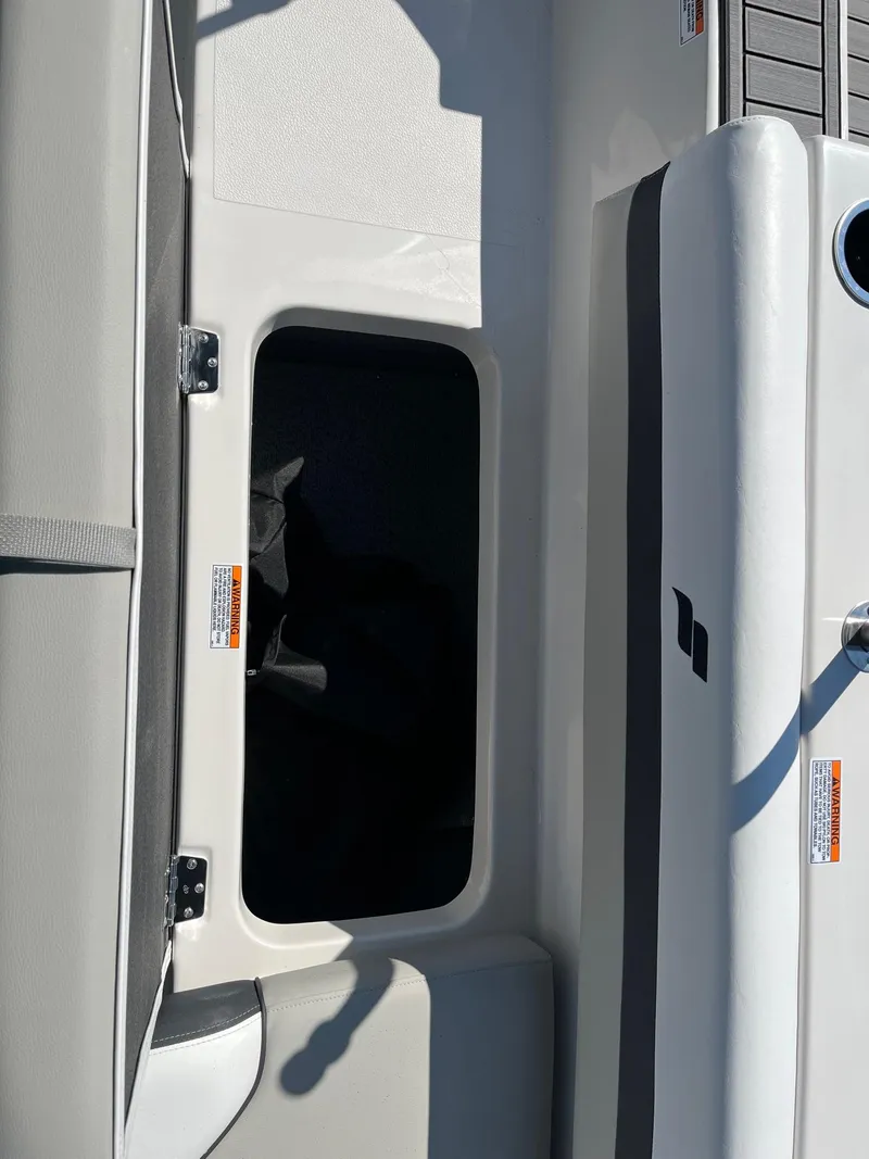 Slide: The Image of 2024 Starcraft SVX 191 boat interior storage compartment. - 18