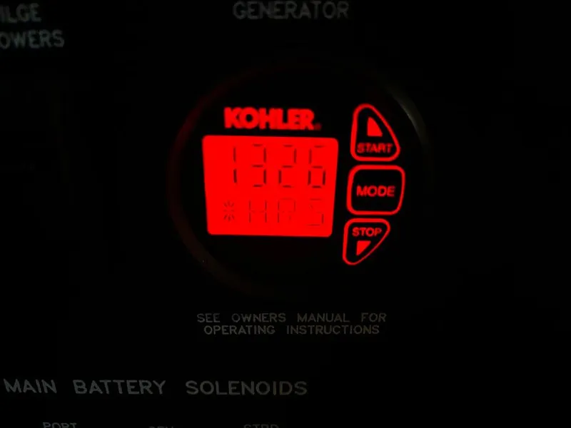Slide: The Image of Kohler generator display on 2008 Sea Ray 38 Sundancer, showing 1326 hours. - 19
