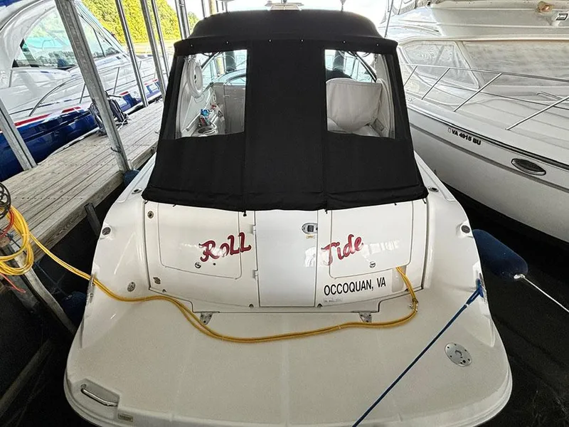 Slide: The Image of 2008 Sea Ray 38 Sundancer docked, rear view with black cover, Occoquan, VA. - 2