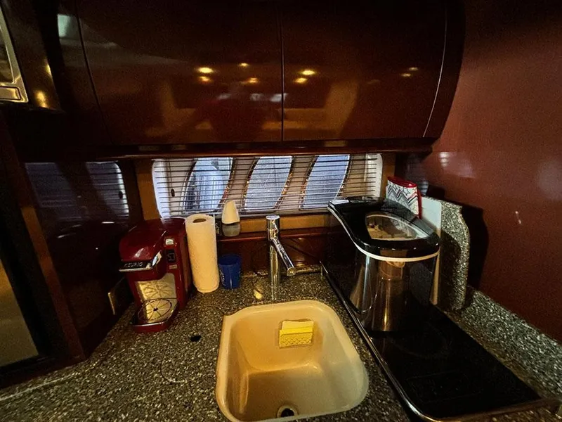 Slide: The Image of Interior kitchen of 2008 Sea Ray 38 Sundancer yacht with sink and appliances. - 23