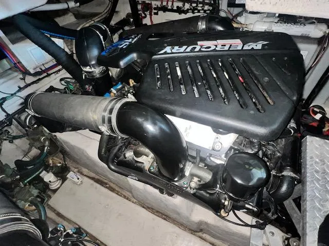 Slide: The Image of Engine compartment of 2008 Sea Ray 38 Sundancer with Mercury engine. - 34