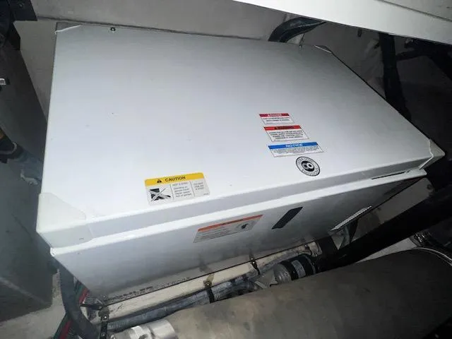 Slide: The Image of Engine compartment of 2008 Sea Ray 38 Sundancer boat. - 36