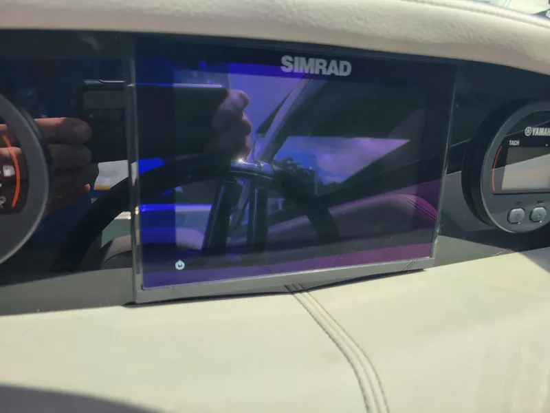 Slide: The Image of Simrad display on the 2024 Four Winns HD5 OB boat dashboard. - 10