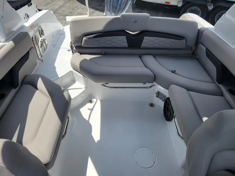 Slide: The Image of 2024 Four Winns HD5 OB boat interior with luxurious seating. - 14