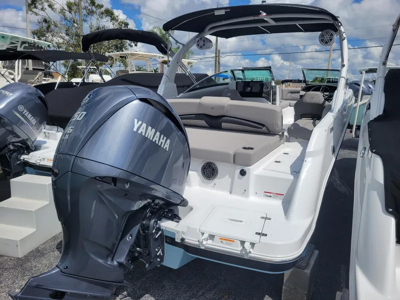 Slide: The Image of 2024 Four Winns HD5 OB boat with Yamaha outboard motor. - 2