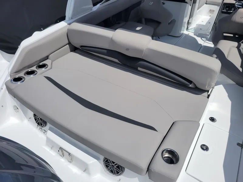 Slide: The Image of 2024 Four Winns HD5 OB boat with spacious seating and cup holders. - 4