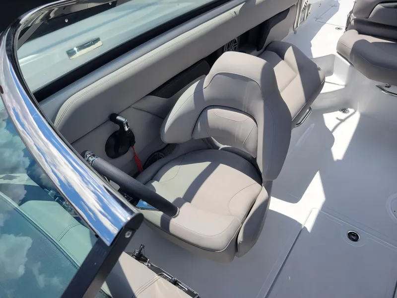 Slide: The Image of 2024 Four Winns HD5 OB boat interior with comfortable seating. - 8