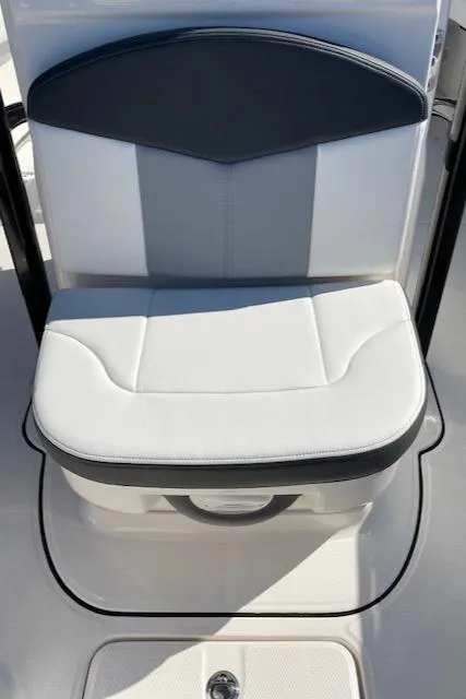 Slide: The Image of 2024 Robalo R222 Center Console boat seat with white and gray upholstery. - 12