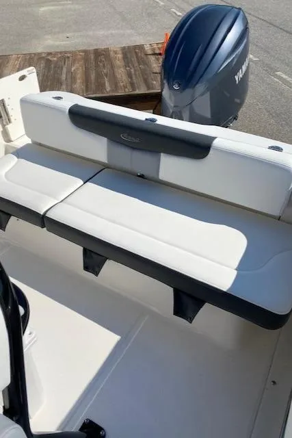 Slide: The Image of 2024 Robalo R222 Center Console boat with Yamaha outboard engine. - 13