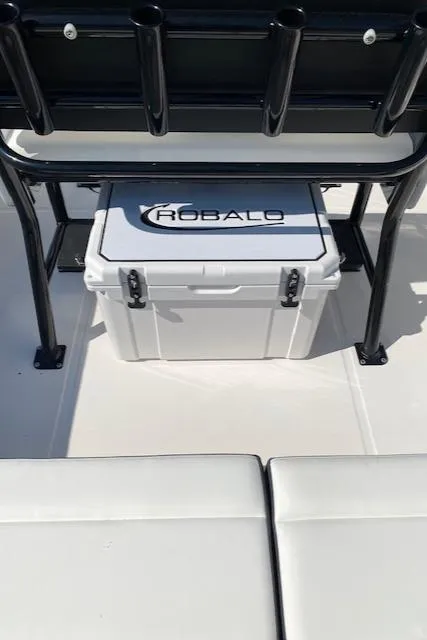 Slide: The Image of 2024 Robalo R222 Center Console boat with cooler and seating. - 20
