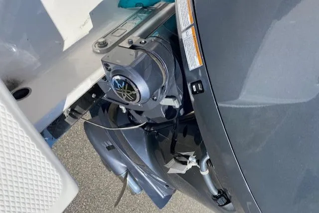 Slide: The Image of 2024 Robalo R222 Center Console boat engine close-up. - 25
