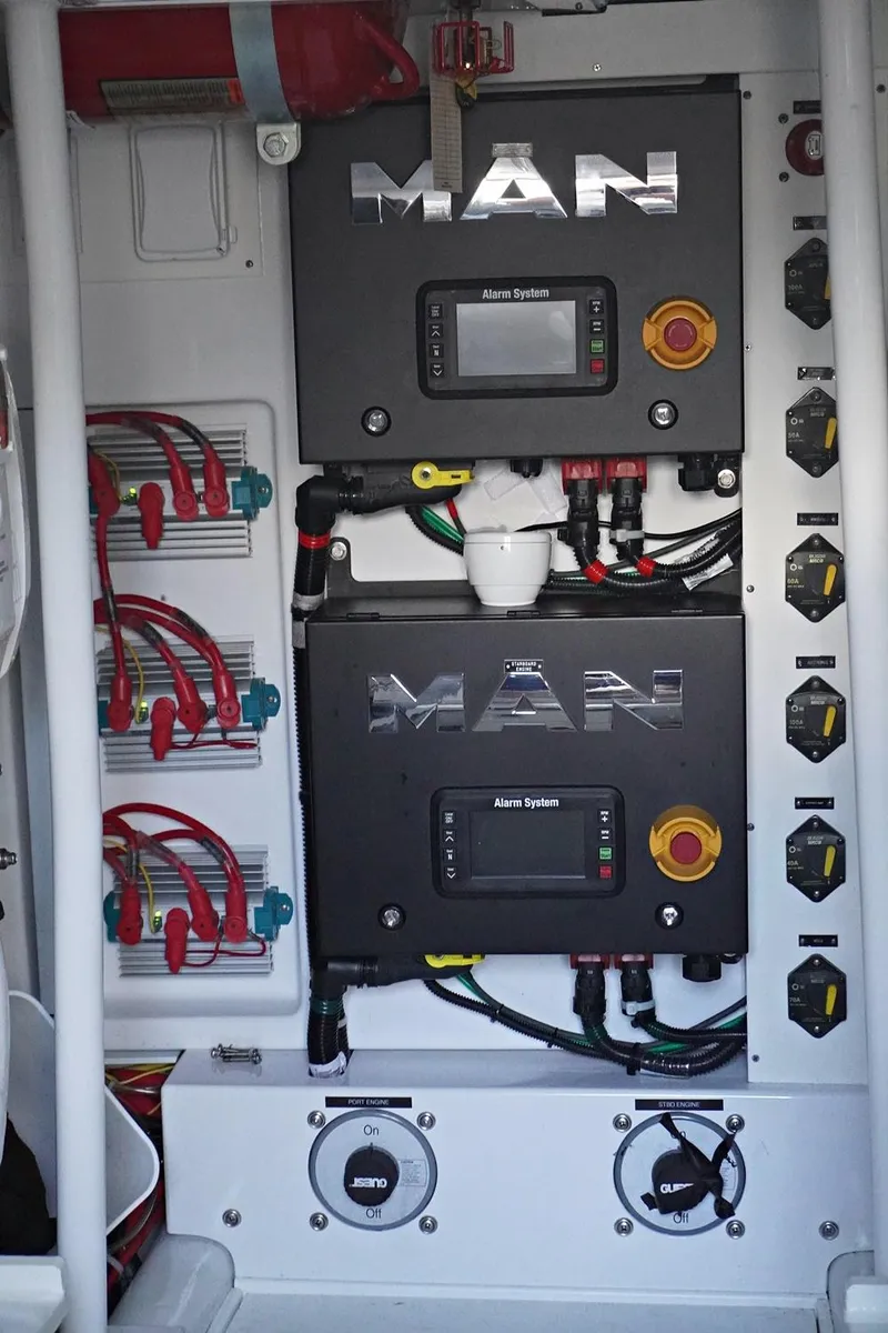 Slide: The Image of Engine control panel of a 2022 Henriques 42EXHT boat. - 29