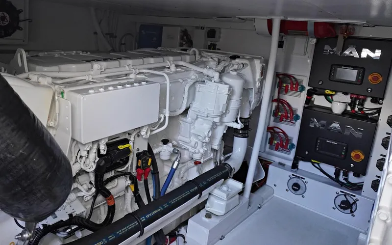 Slide: The Image of Engine room of a 2022 Henriques 42EXHT boat with MAN engines. - 30