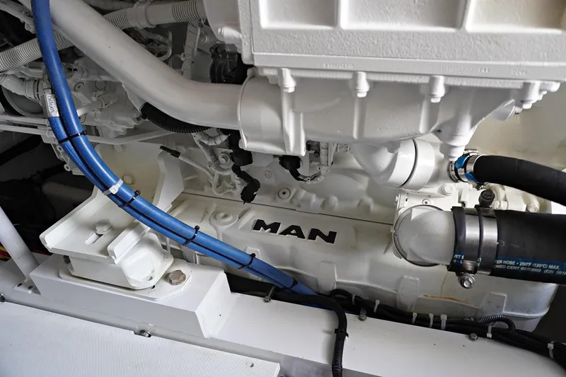 Slide: The Image of Engine compartment of a 2022 Henriques 42EXHT boat with MAN engine. - 31
