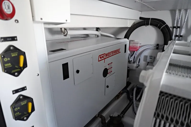 Slide: The Image of Henriques 42EXHT 2022 engine room with Westerbeke generator. - 32