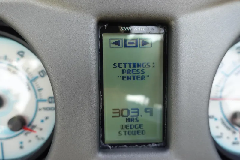 Slide: The Image of Dashboard of 2020 Axis T22 boat showing settings and hours logged. - 27