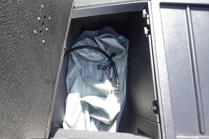 Slide: The Image of Axis T22 2020 storage compartment with ballast bag and hose. - 41