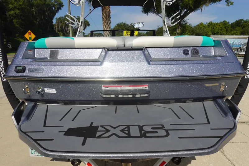 Slide: The Image of 2020 Axis T22 boat rear view with swim platform and seating. - 9