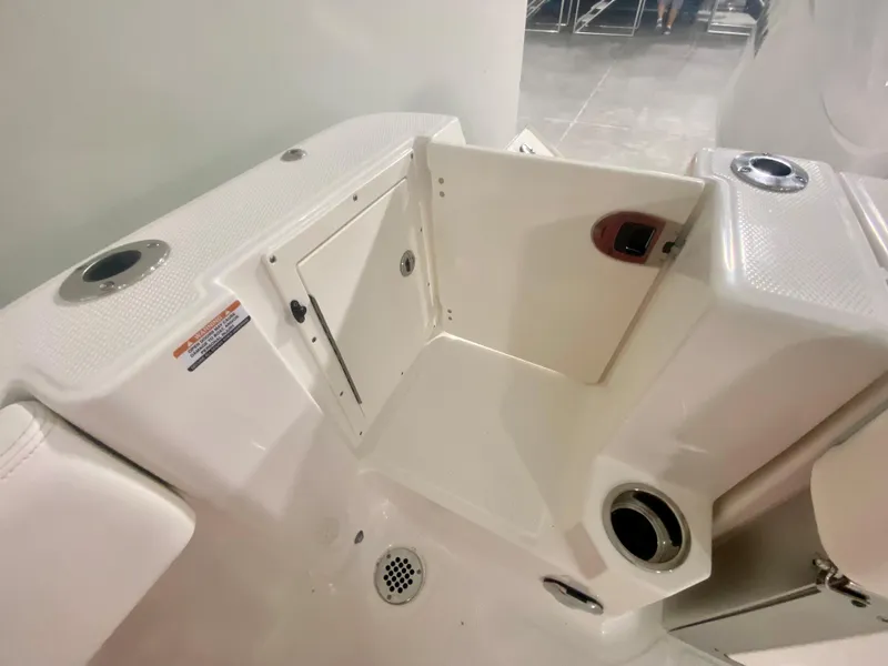 Slide: The Image of 2024 Robalo R270 boat interior storage compartment. - 6