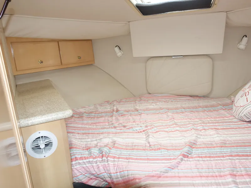 Slide: The Image of Interior cabin of 2000 Carver 406 Aft Cabin Motor Yacht with bed and storage. - 18