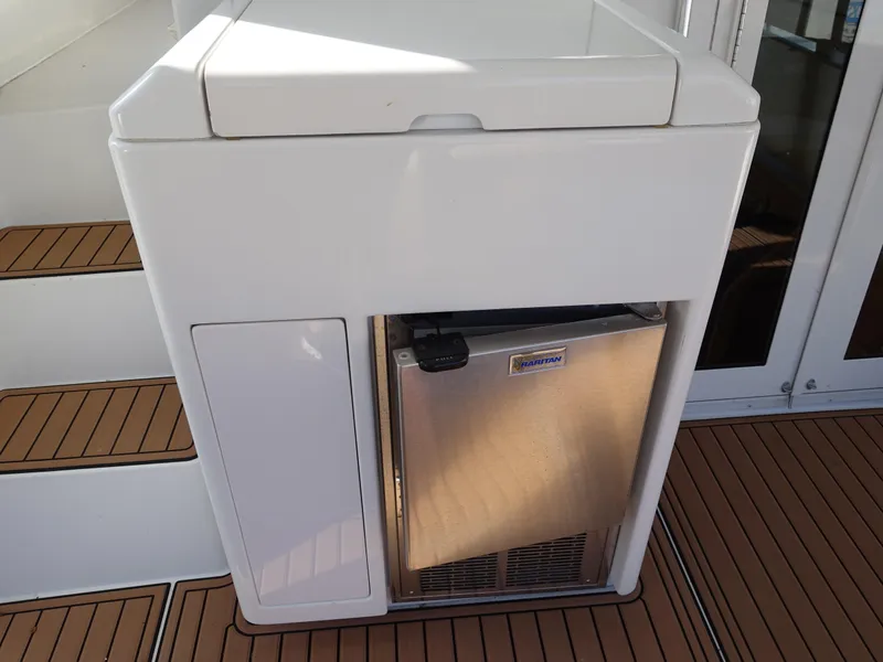Slide: The Image of Compact fridge on 2000 Carver 406 Aft Cabin Motor Yacht deck. - 38