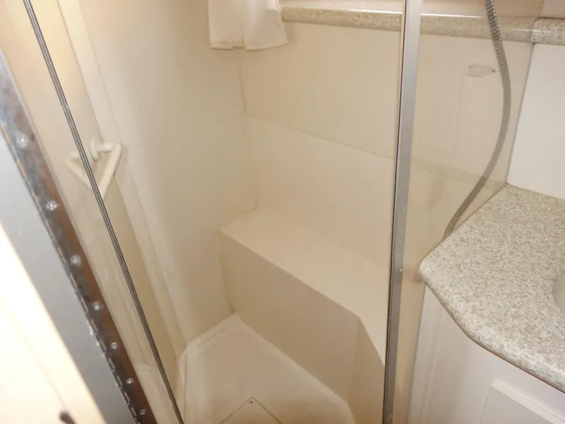 Slide: The Image of Shower area in 2000 Carver 406 Aft Cabin Motor Yacht bathroom. - 34