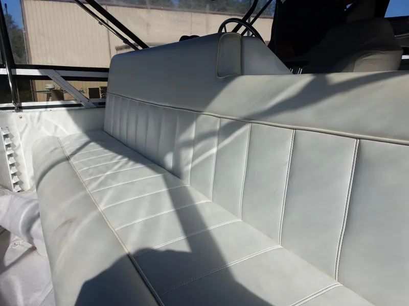 Slide: The Image of White leather seating on 2000 Carver 406 Aft Cabin Motor Yacht. - 49
